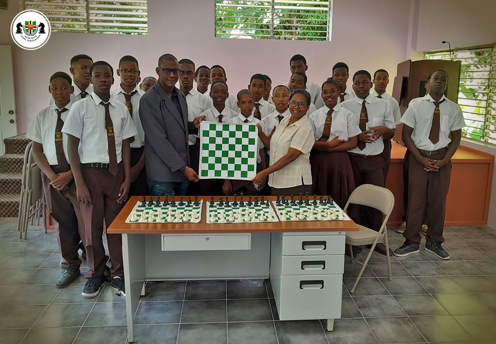 Dominica Chess Federation at the handing over of chess sets, supporting the growth of chess in the community and providing resources for future players.